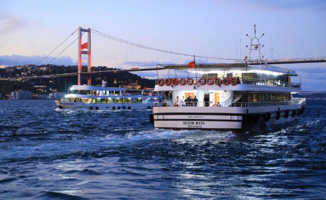 Bosphorus sunset cruise under 15 Temmuz Şehitler Bridge