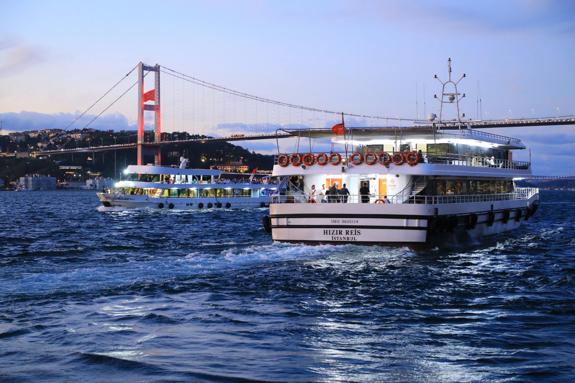 Bosphorus sunset cruise under 15 Temmuz Sehitler Bridge