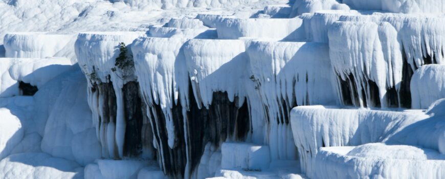 Pamukkale travel guide 2026 — white travertines, Hierapolis ancient city and Cleopatra's Pool