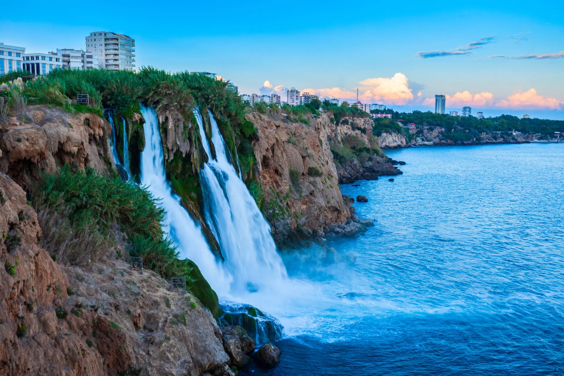 Lower Düden waterfall dropping from cliffs straight into the Mediterranean near Antalya