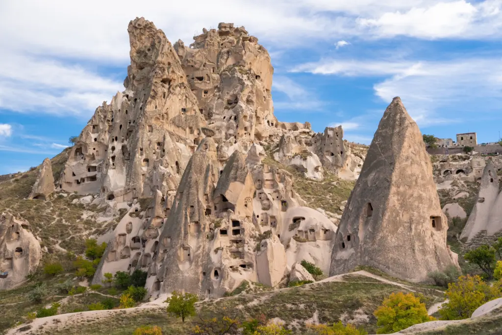 Uchisar rock and fairy chimneys under a cloudy autumn sky, Cappadocia, Turkey