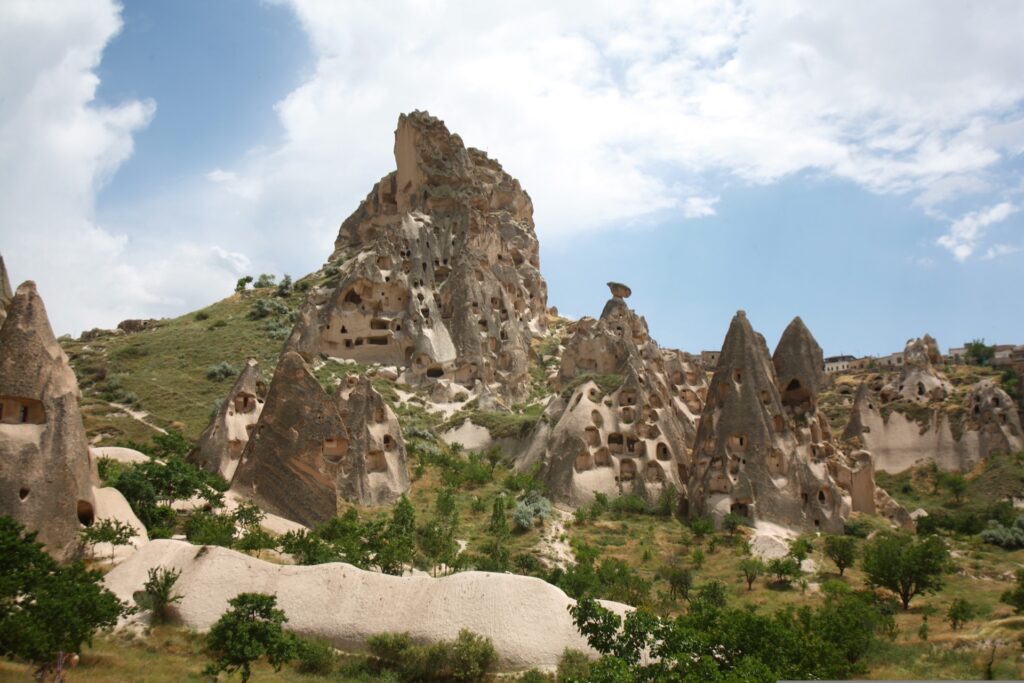 Uchisar Castle rock fortress rising above the valley, Cappadocia