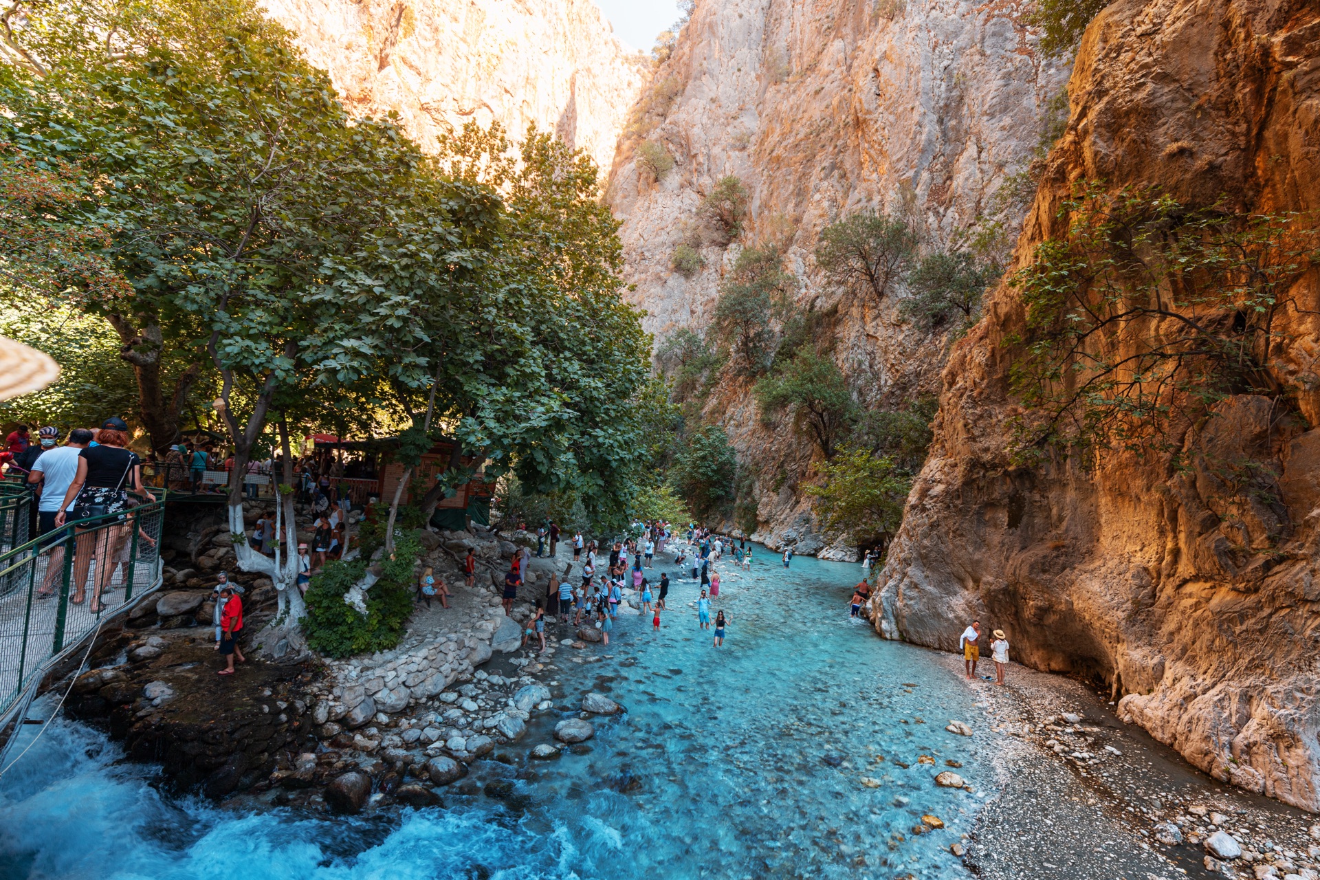 27 august 2021 saklikent canyon turkey crowds of tourists chill and relax in cool water of the famous saklikent gorge natural wonders and sightseeing
