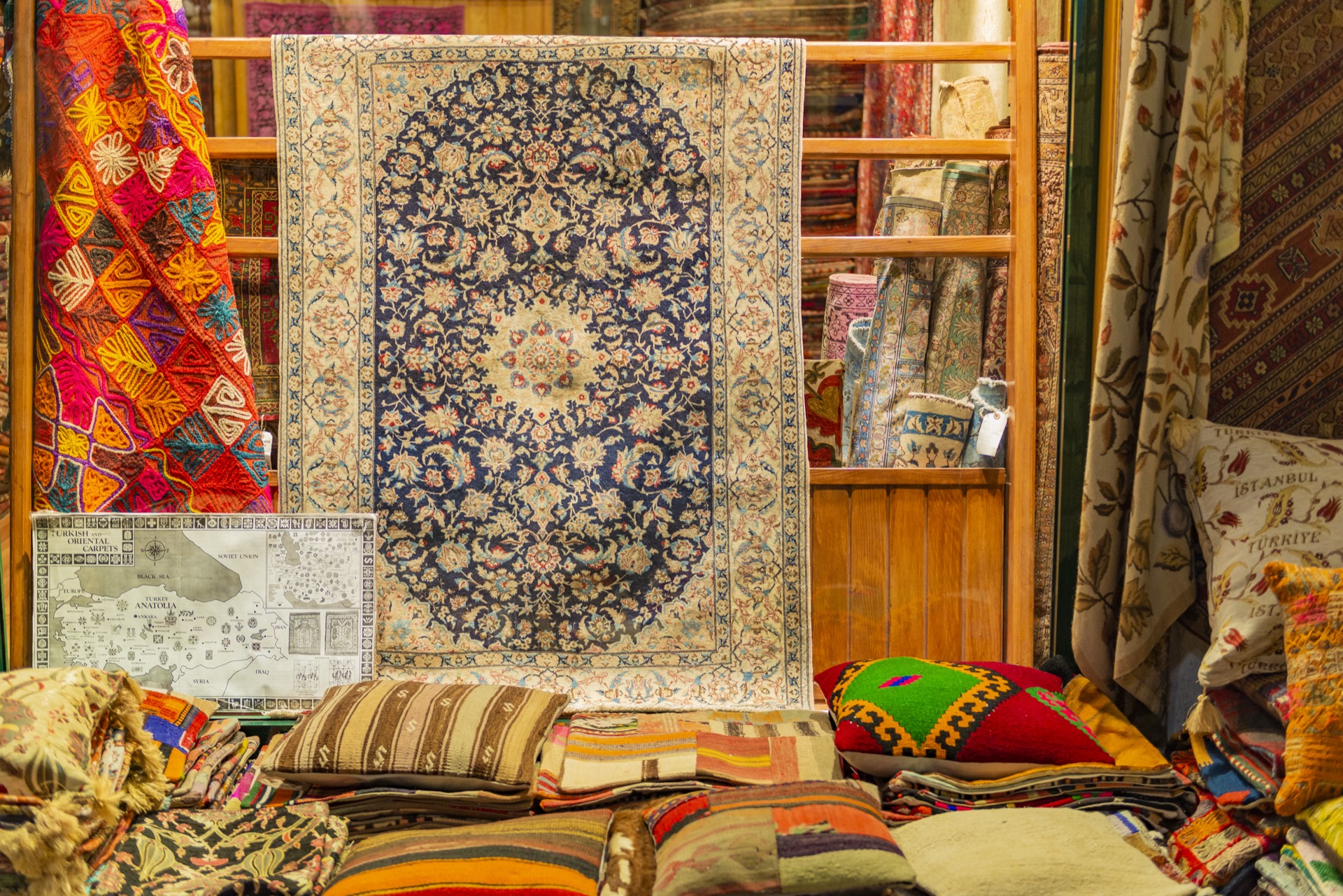 Carpets, kilims and cushion covers on display at a shop in the Grand Bazaar, Istanbul