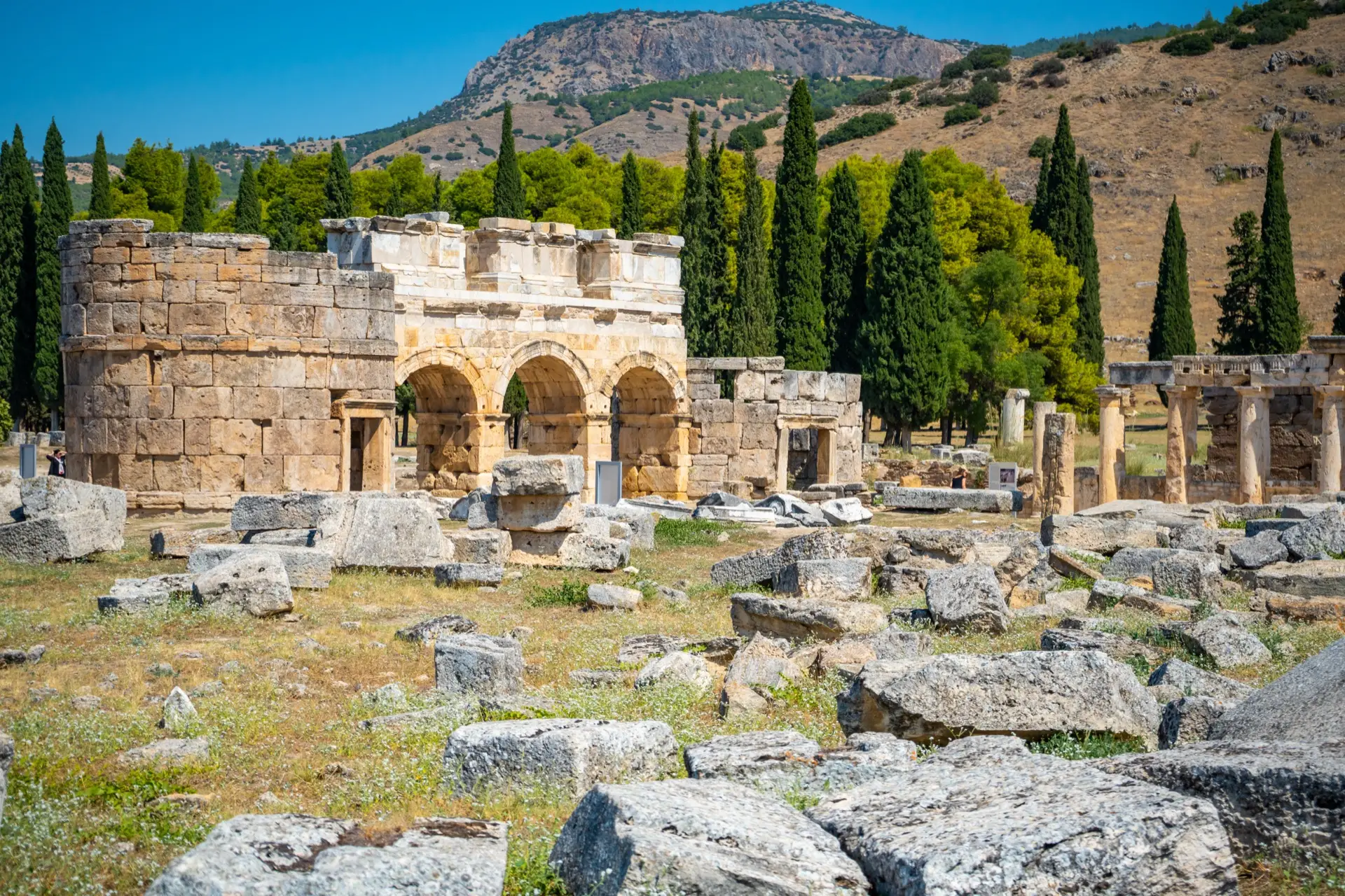 Stone arched gateway of Hierapolis ancient city above Pamukkale