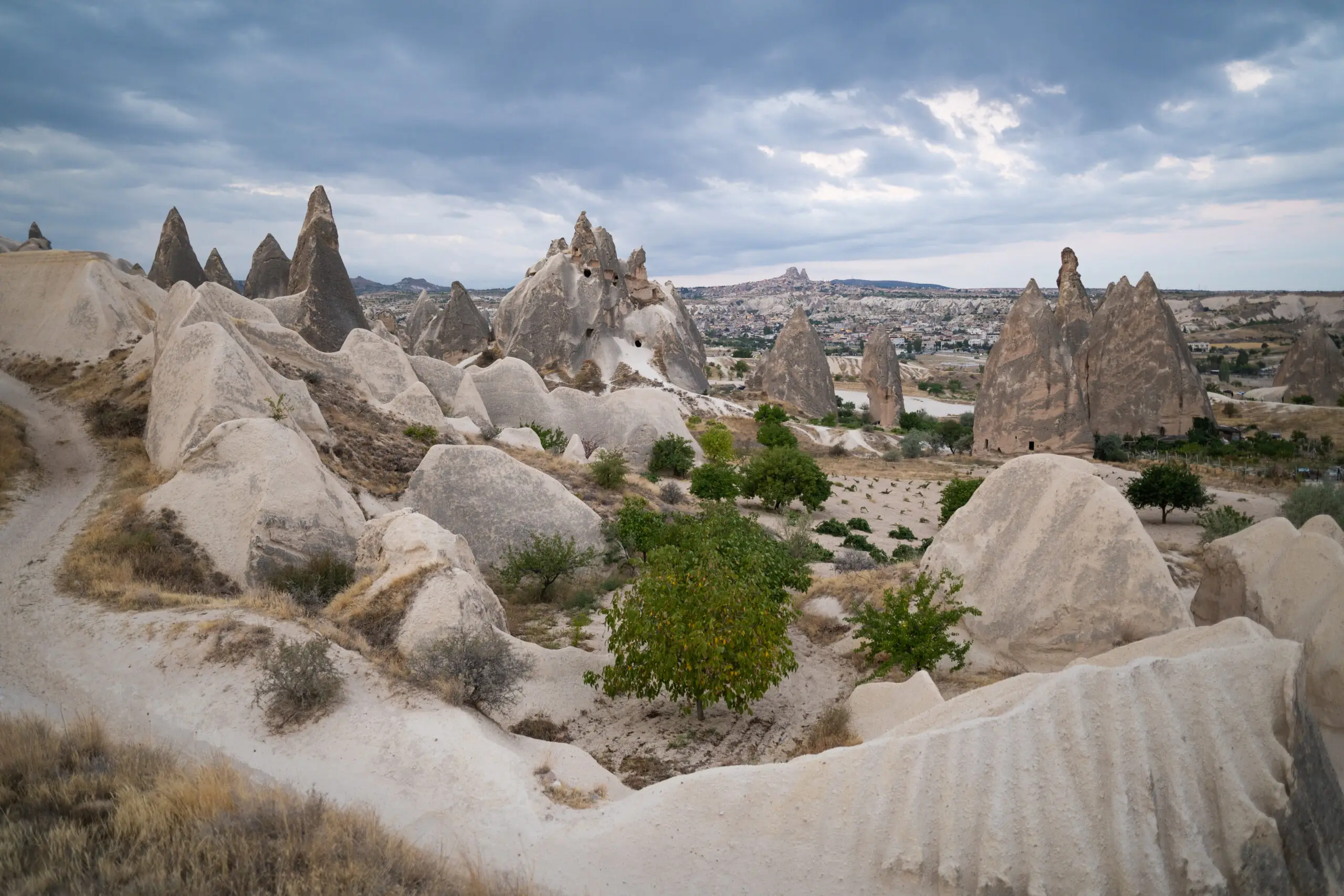 Fairy chimneys and valleys around Göreme in Cappadocia under a flat grey overcast sky